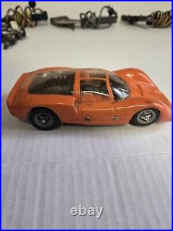 2 Vintage 1/24 scale Slot Cars & A Chassis With 3 Controllers Parts or Repair