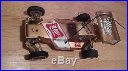 2 Vintage Team Associated RC10 RC buggy (1) A Stamp RC-10 Radio control gold pan