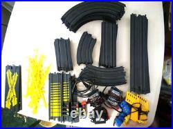 64 Parts Vintage Electric Tyco Racing Track 3 controllers 3 power plugs No cars