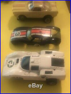 AURORA H. O Slot Car Lot. 10 cars chassis and parts Stickers Vintage