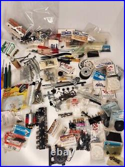 Big lot of various vintage Rc car parts, new, used, gears, suspension