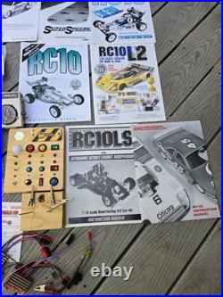 HUGE Lot Of Vintage RC Car Parts, Motors, Manuals, Wheels, Tires, Etc New & Used