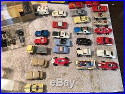 Lot 28 Vintage 60s Aurora. Atlas and others HO Slot Cars plus 2 boxs of parts