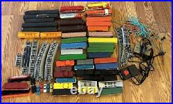 Lot Of 44 HO Vintage Engines, Box Cars, Flat Beds AHM, Tyco, Track, and Parts