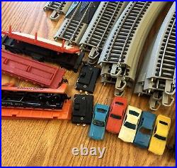 Lot Of 44 HO Vintage Engines, Box Cars, Flat Beds AHM, Tyco, Track, and Parts