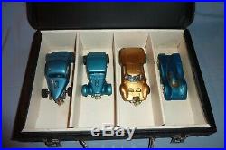 Lot of 4 Vintage 1/24 Scale Slot Cars with Carrying Case and Assorted Parts