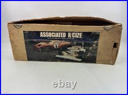 ORIGINAL VINTAGE ASSOCIATED RC12E ONROAD PAN CAR 1/12 SCALE Parts ONLY With Box