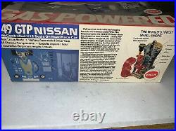 VINTAGE COX. 049 GTP NISSAN RC CAR Open Box Non Working Please review bid
