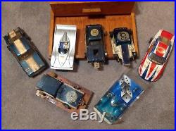 Vintage 1/24th Flexi NASCAR 7 Slot Cars withextra Parts Controllers And Track Box