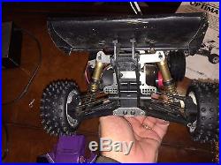 Vintage Kyosho Optima Mid 4WD Off-Road Racer RC Race Car with extra parts car