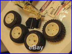 Vintage Team Associated RC 10 Roller'B' Stamp with Wheels and Parts Fast Ship