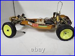 Vintage Team Associated RC10 Gold Rc Car Chassis With Manual And Lots Of Parts