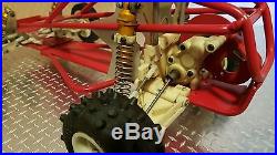 Vintage Team Associated RC10 withRoll Cage, Stealth Trans, Extra Parts Gold Pan