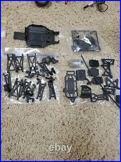 Vintage Team losi mini t/desert truck 1/18 and large parts lot, new brushless