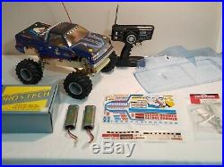 Vintage Traxxas Sledgehammer. Comes with original body and new body