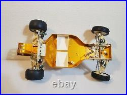 Vintage rc10 Team Associated gold pan RC Car CHASSIS PARTS CAR
