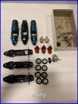 Vintage scalextric tin cars and parts. Perfect restoration lot. (rare parts)