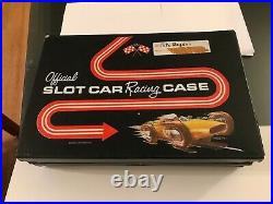 Vintage white Chaparral Cox Slot car, and case full of parts