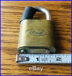 Vtg FORD MOTOR CO. SPARE TIRE LOCK withKEY 1970s Bronco brass padlock accessory